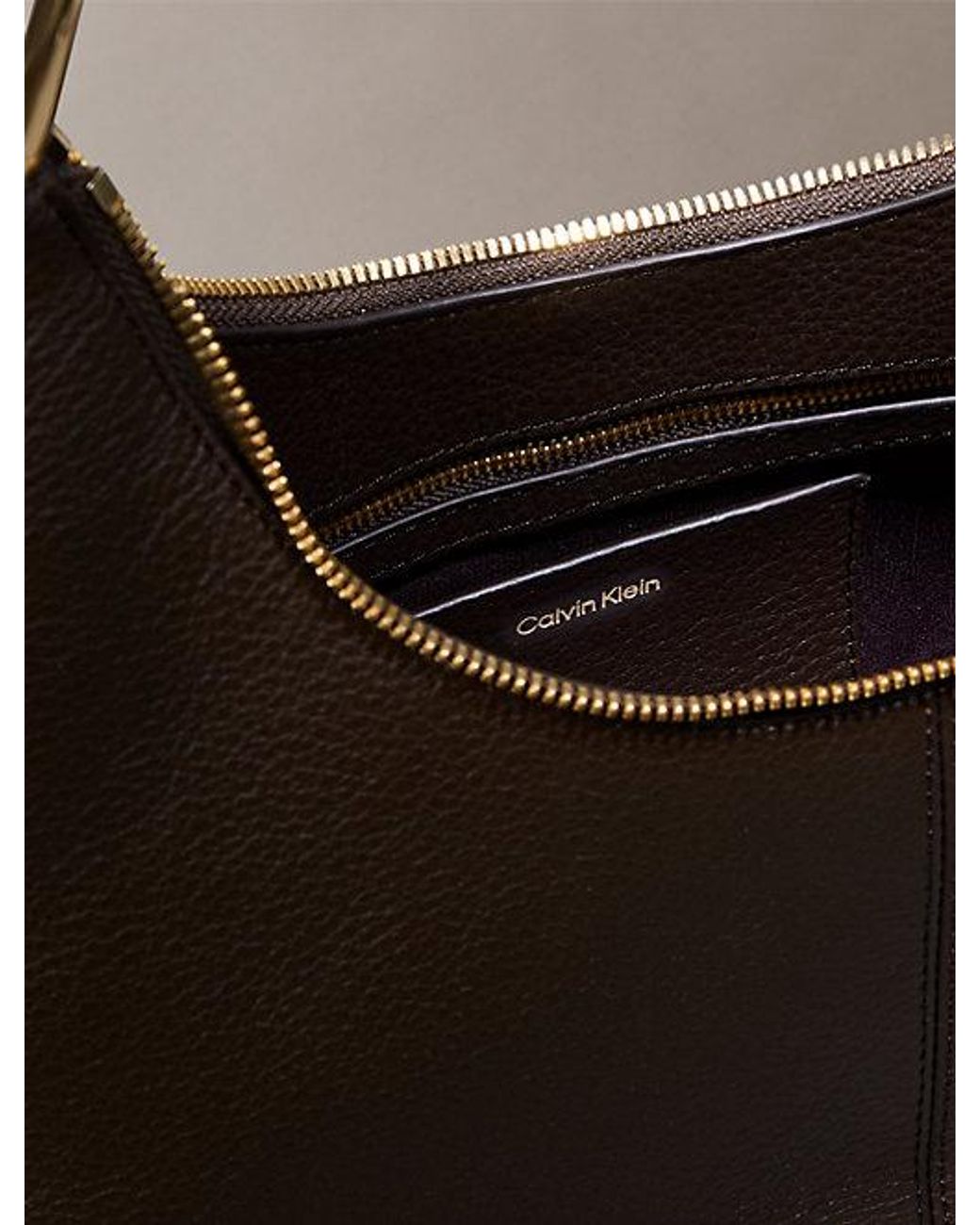 Calvin Klein Gray Soft Leather Asymmetrical Shoulder Bag