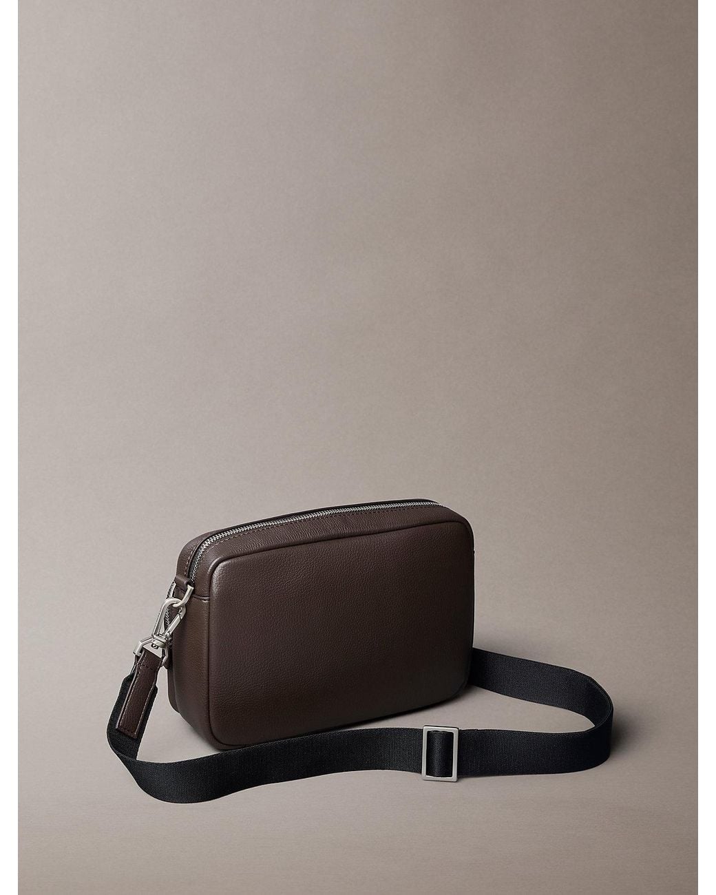 Calvin Klein Gray Logo Pebbled Crossbody Camera Bag for men