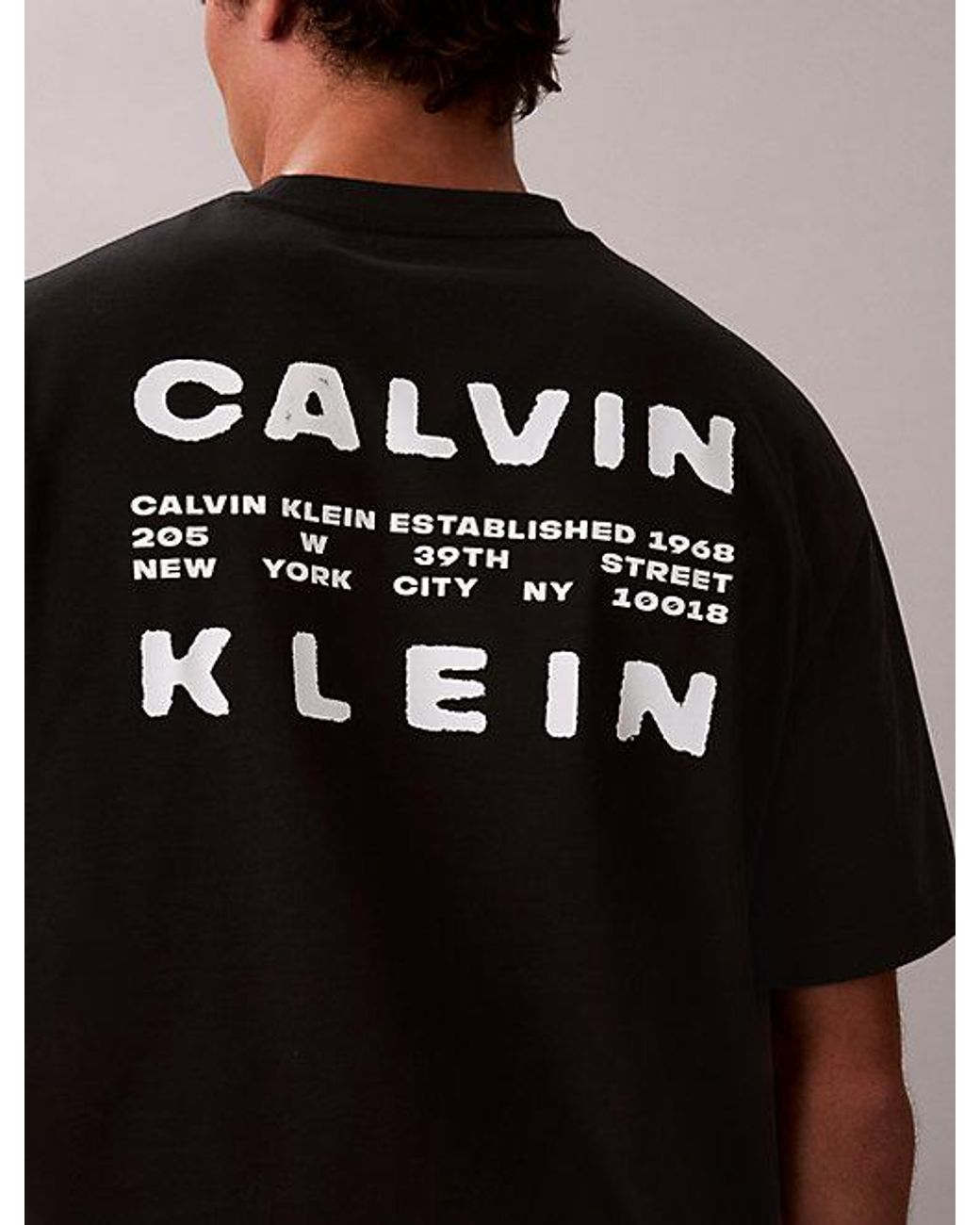 Calvin Klein Black Jeans Relaxed Stencil Logo Graphic Tee for men