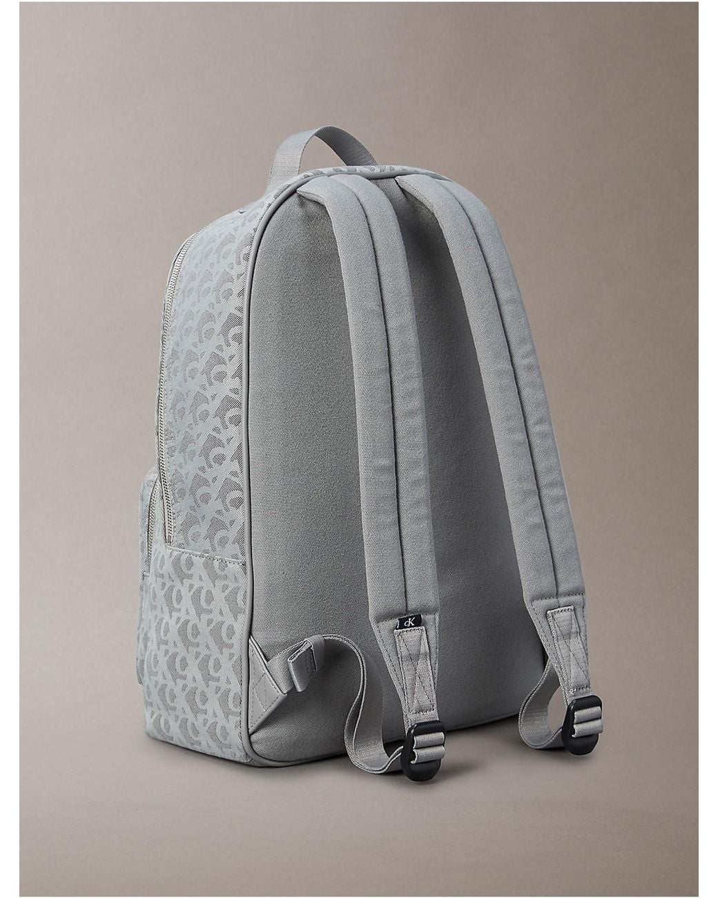 Calvin Klein Leaf Patterned Black and Gray Backpack Amazon.com: Calvin Klein Reyna Novelty Key Item Flap  main image 2