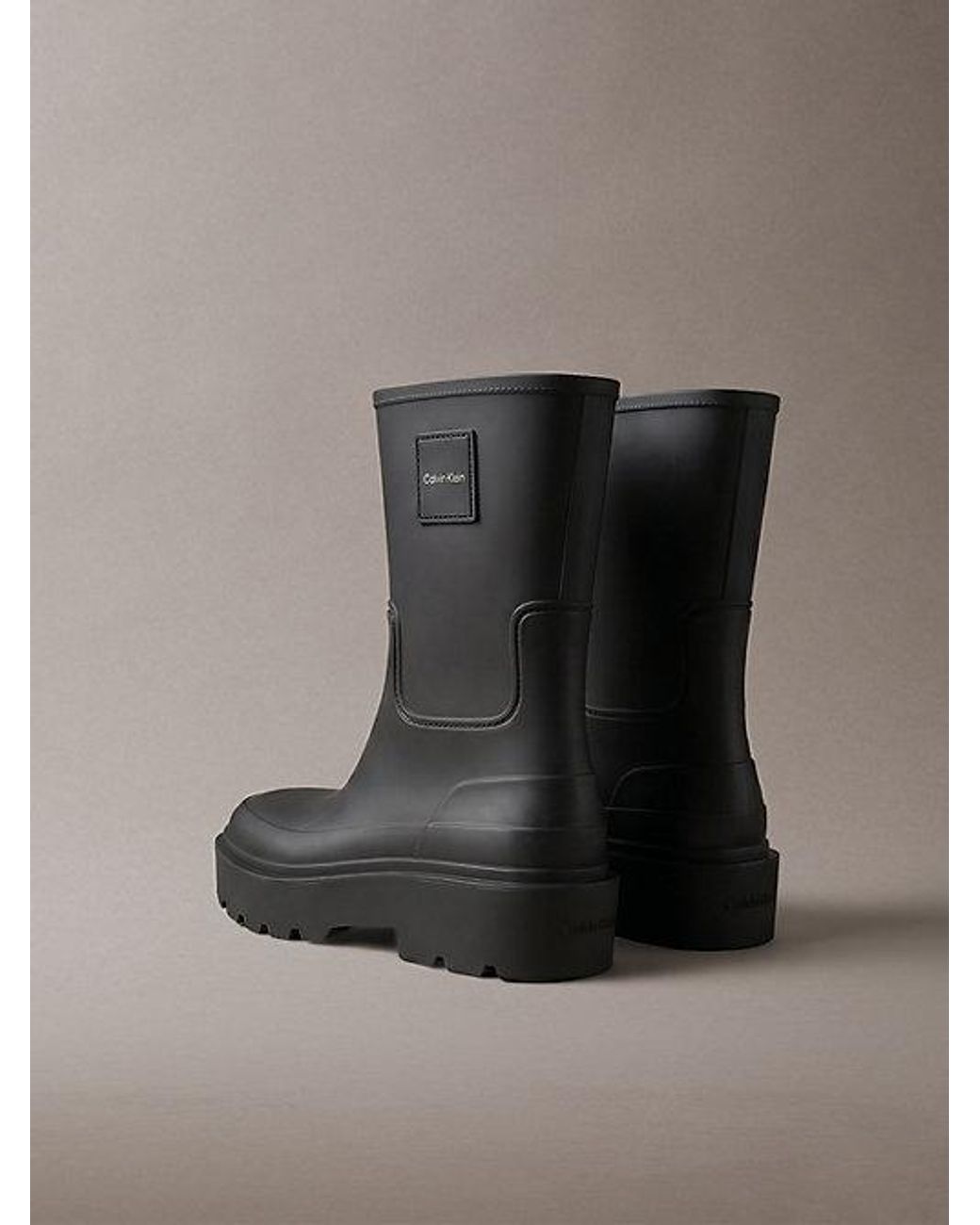 Calvin Klein Black Heeled Flexible Lug Sole Rain Boots