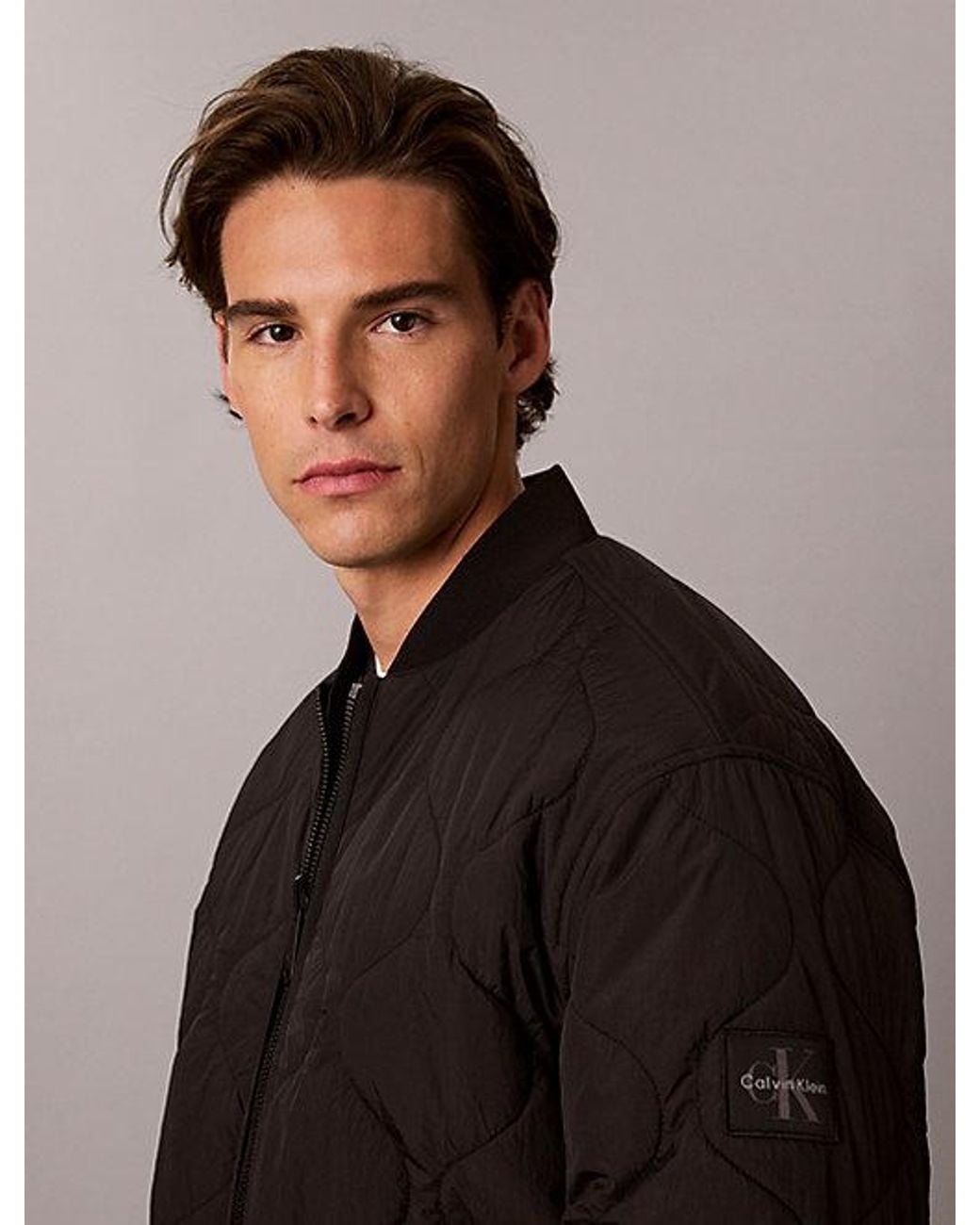 Calvin Klein Black Jeans Reversible Logo Quilted Jacket for men