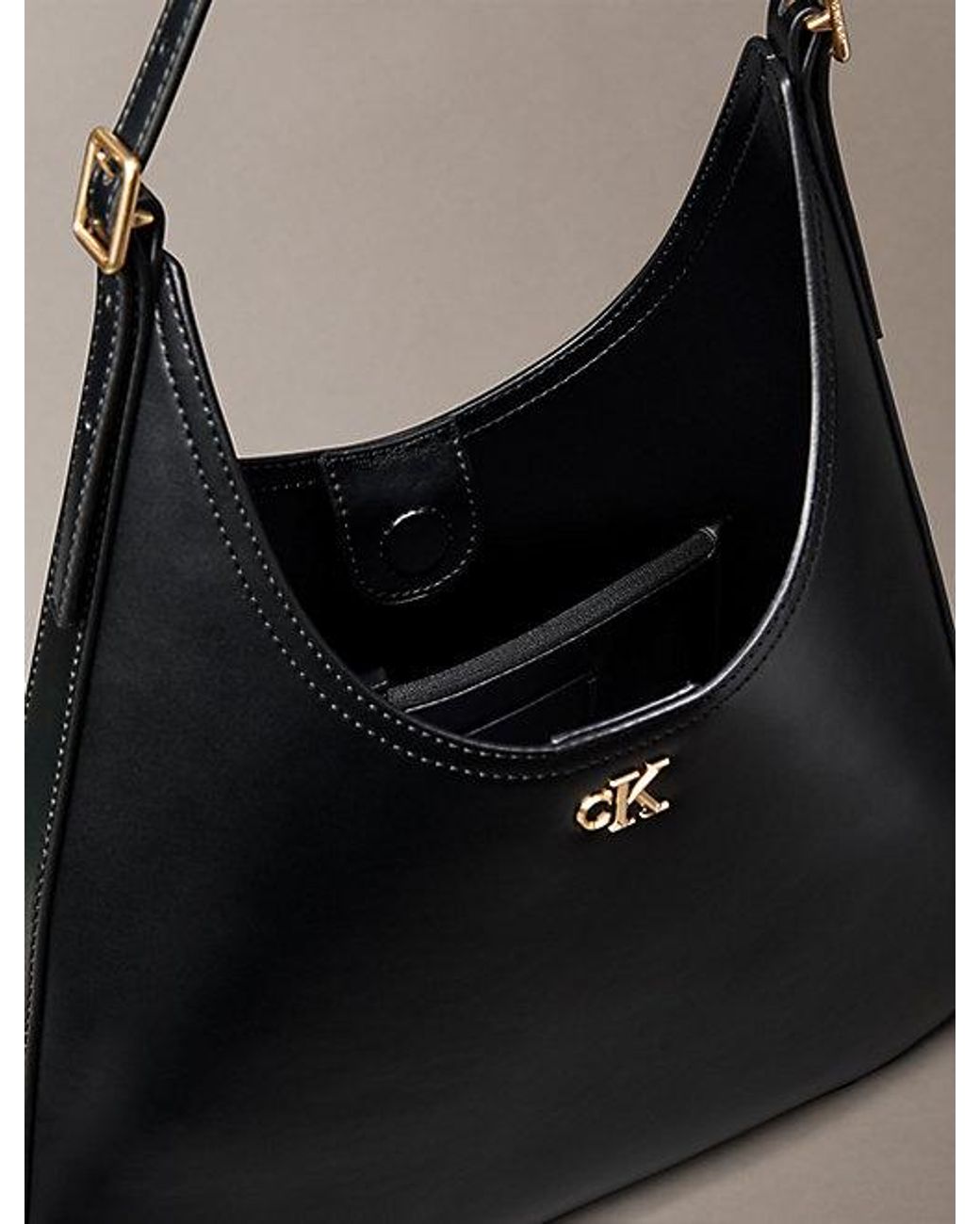 Calvin Klein Black Monogram Hardware Curved Shoulder Bag