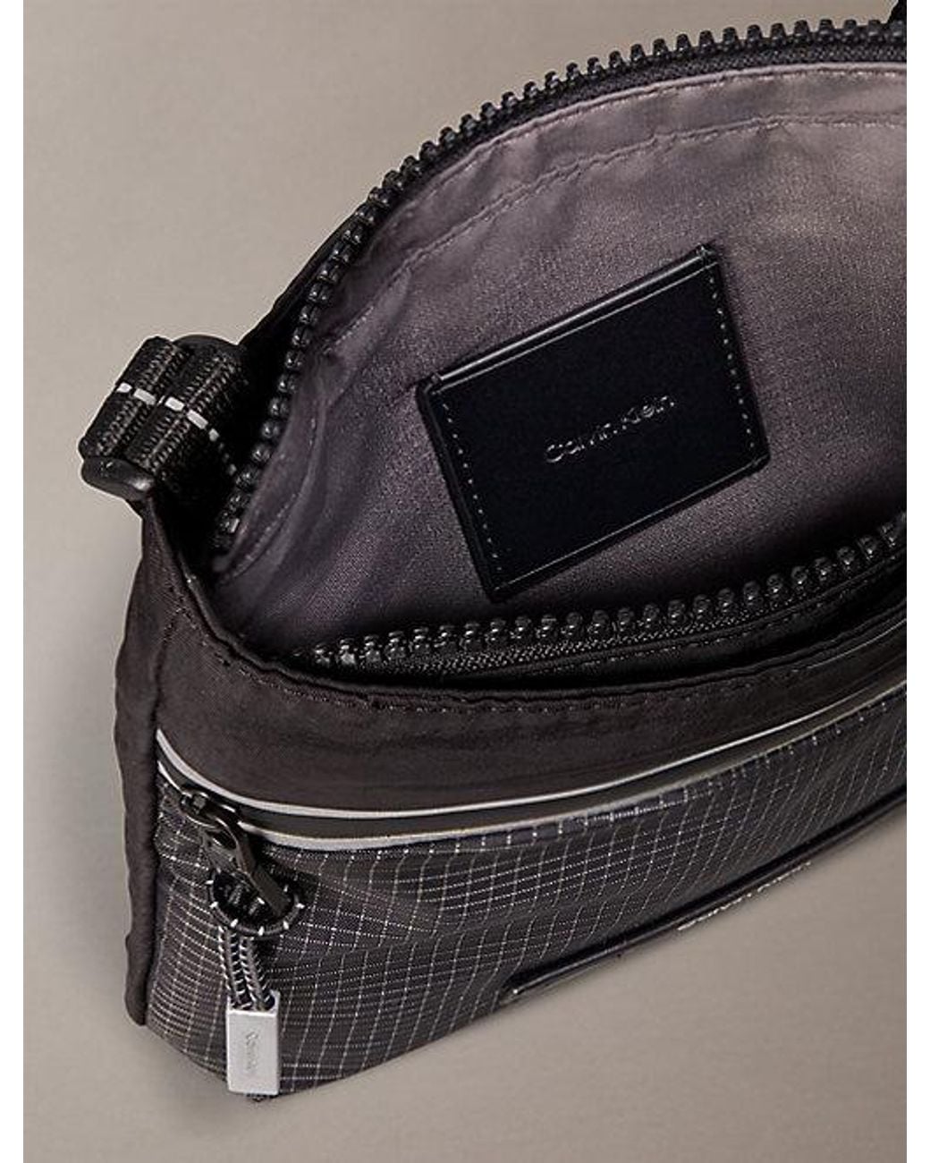 Calvin Klein Black Striped Utility Zip Flat Pack for men