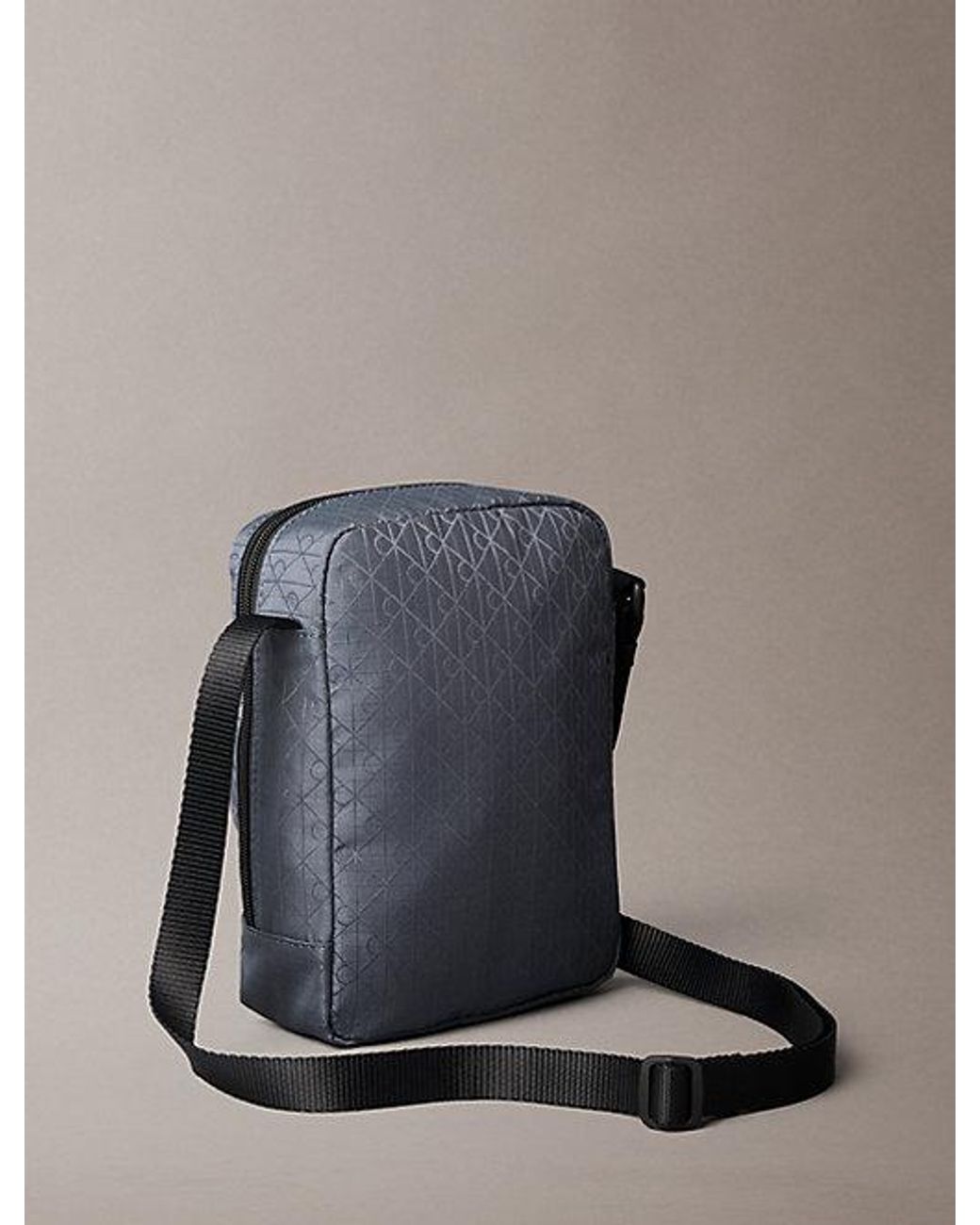 Calvin Klein Blue Water Repellent Crossbody Camera Bag for men
