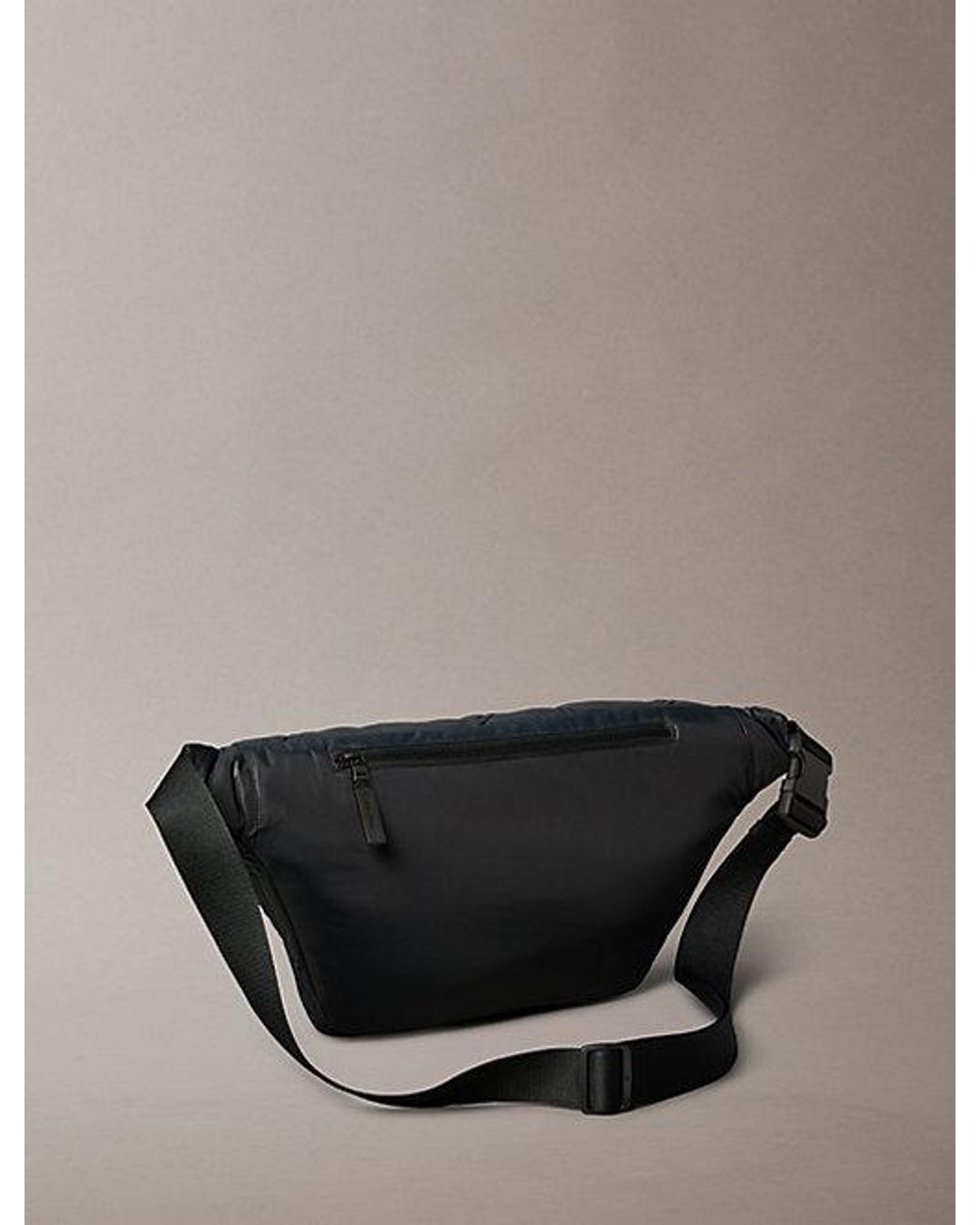 Calvin Klein Gray Puffer Monogram Logo Sling Bag for men