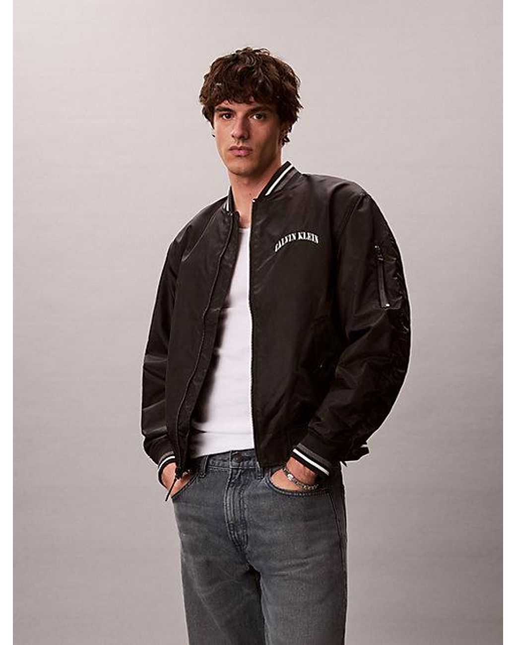 Calvin Klein Black Jeans Varsity Logo Bomber Jacket for men