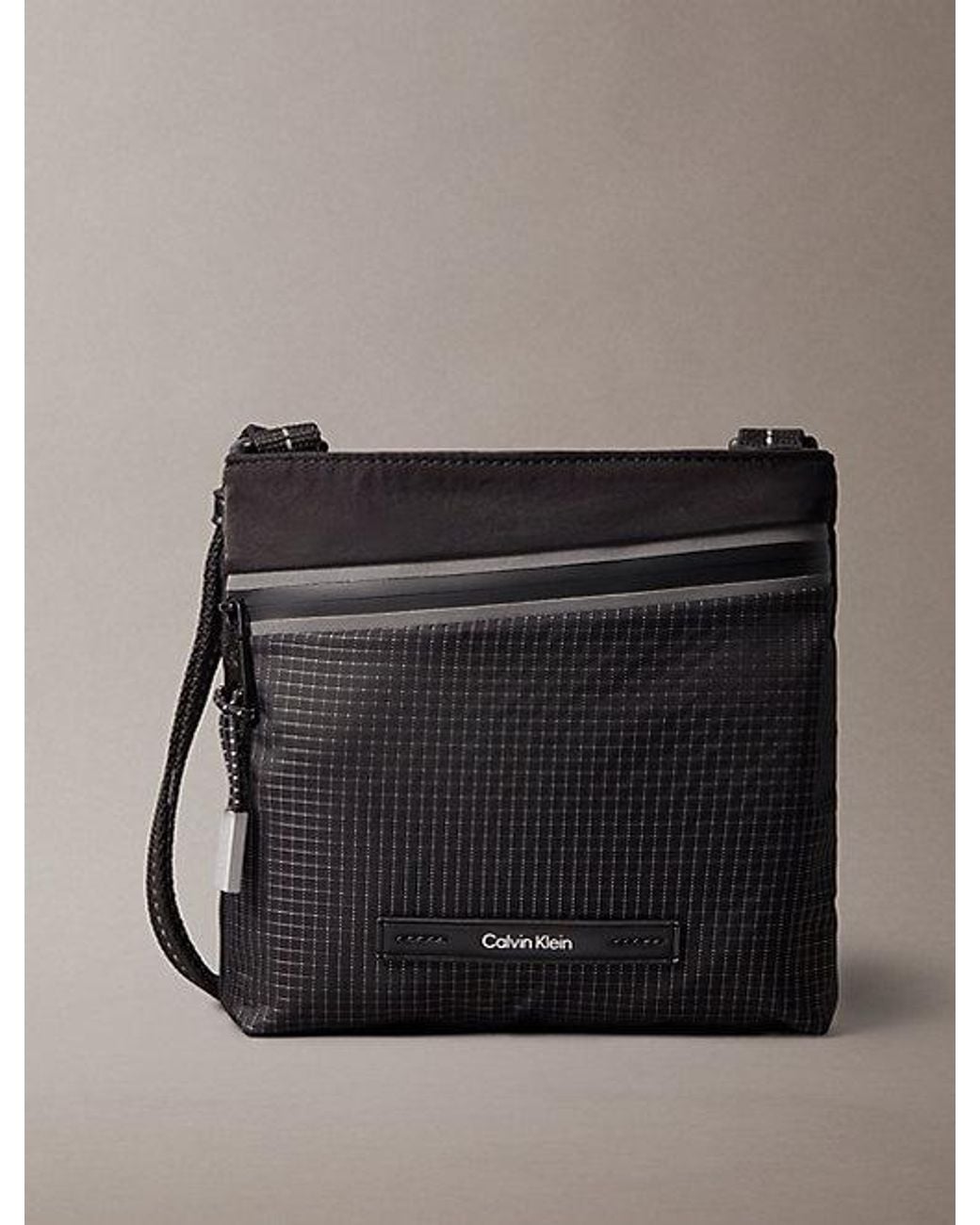 Calvin Klein Black Striped Utility Zip Flat Pack for men