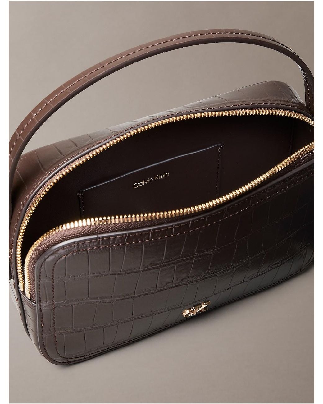 Calvin Klein Monogram Crocodile Camera Bag in Brown | Lyst