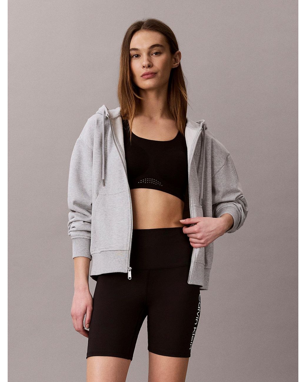 Pantaloncini Da Palestra Alla Coscia A Vita Alta Ad Asciugatura Rapida di Calvin Klein in Brown