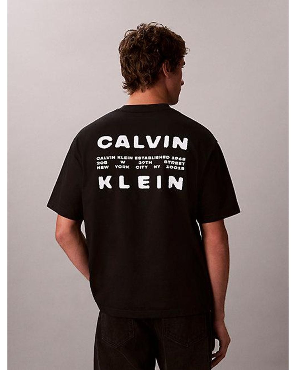 Calvin Klein Black Jeans Relaxed Stencil Logo Graphic Tee for men