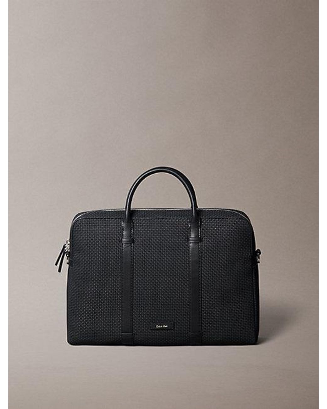 Calvin Klein Gray Embossed Woven Commuter Bag for men