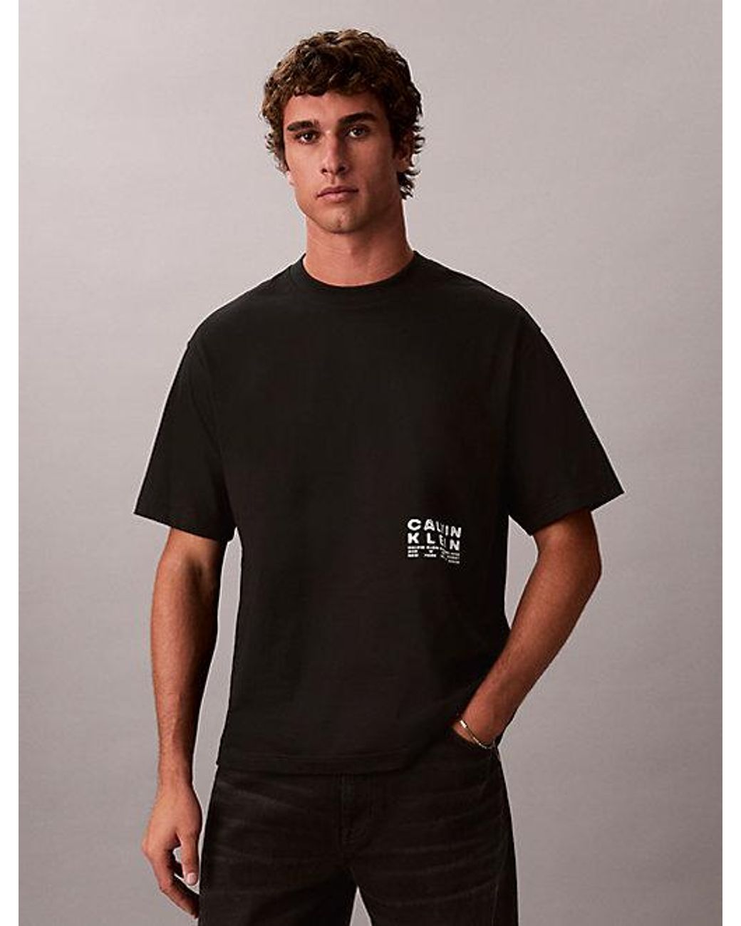 Calvin Klein Black Jeans Relaxed Stencil Logo Graphic Tee for men