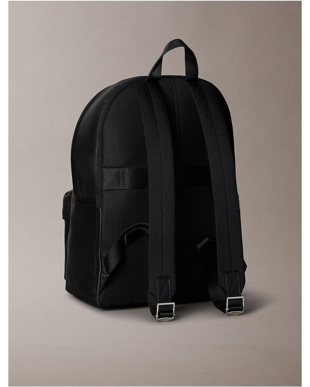 Calvin Klein Gray Pebble Round Backpack for men