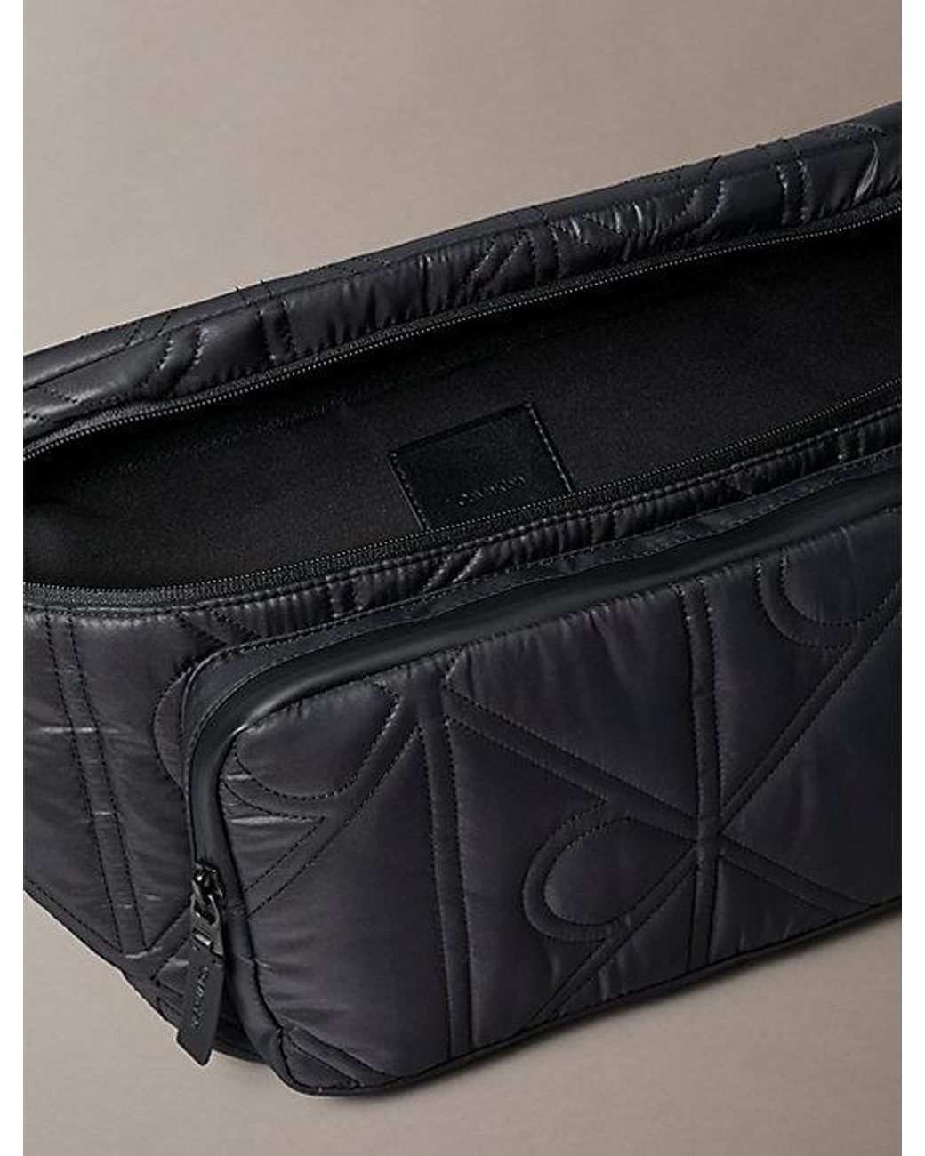Calvin Klein Gray Puffer Monogram Logo Sling Bag for men
