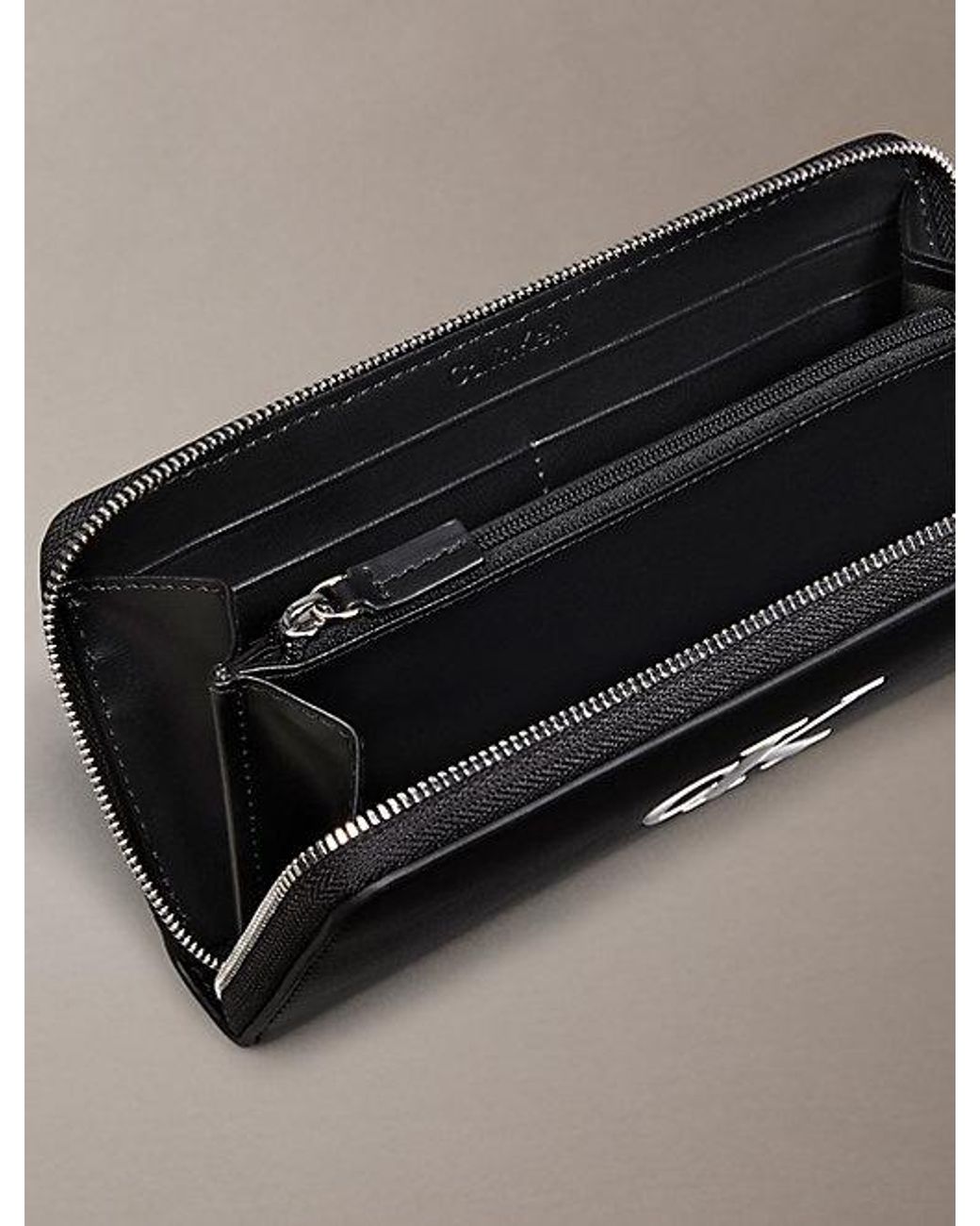 Calvin Klein Multicolor Embossed Monogram Long Zip Wallet