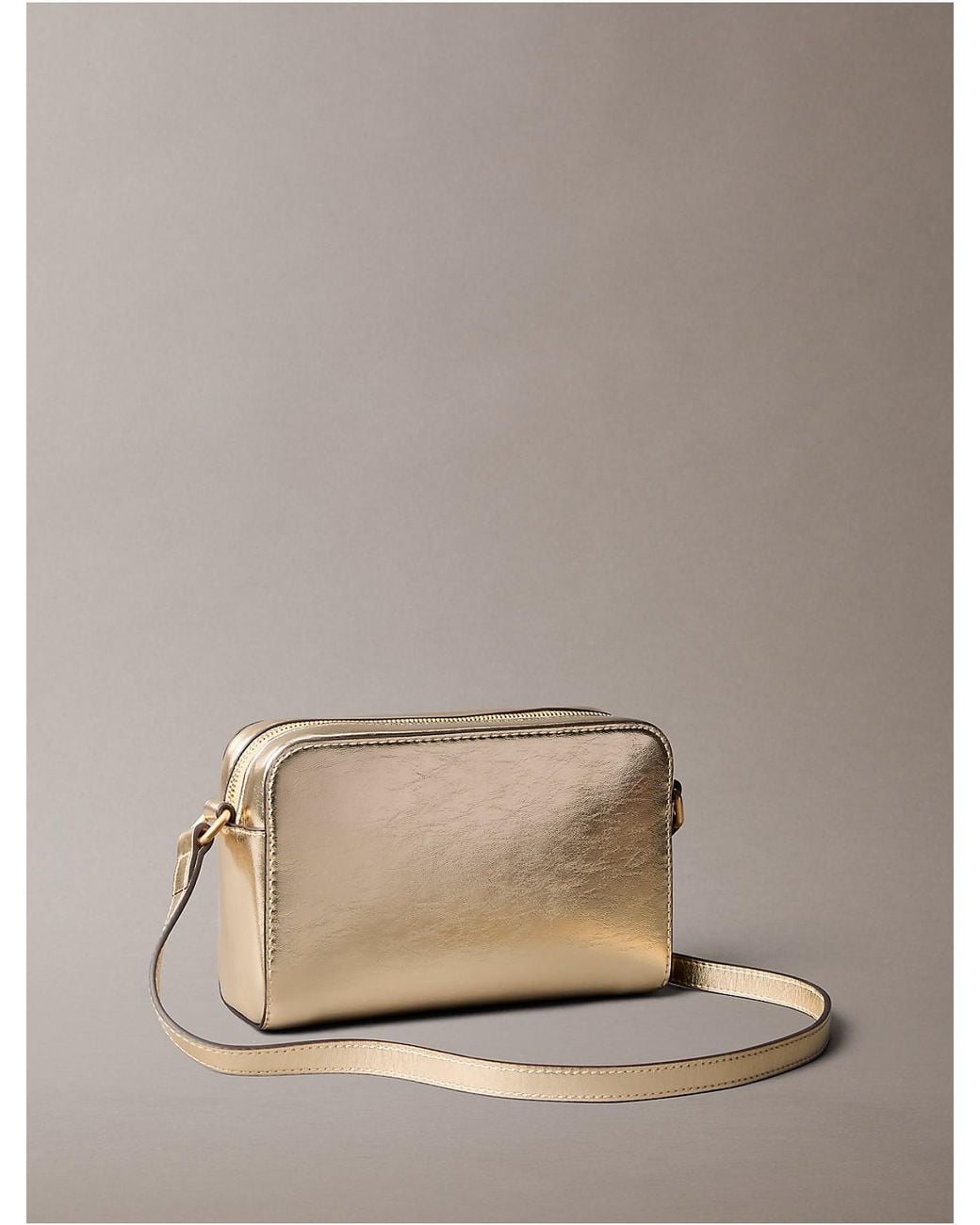 Calvin Klein Natural Metallic Monogram Camera Bag