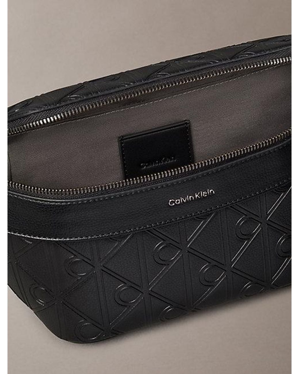 Calvin Klein Gray Embossed Emblem Logo Bum Bag for men