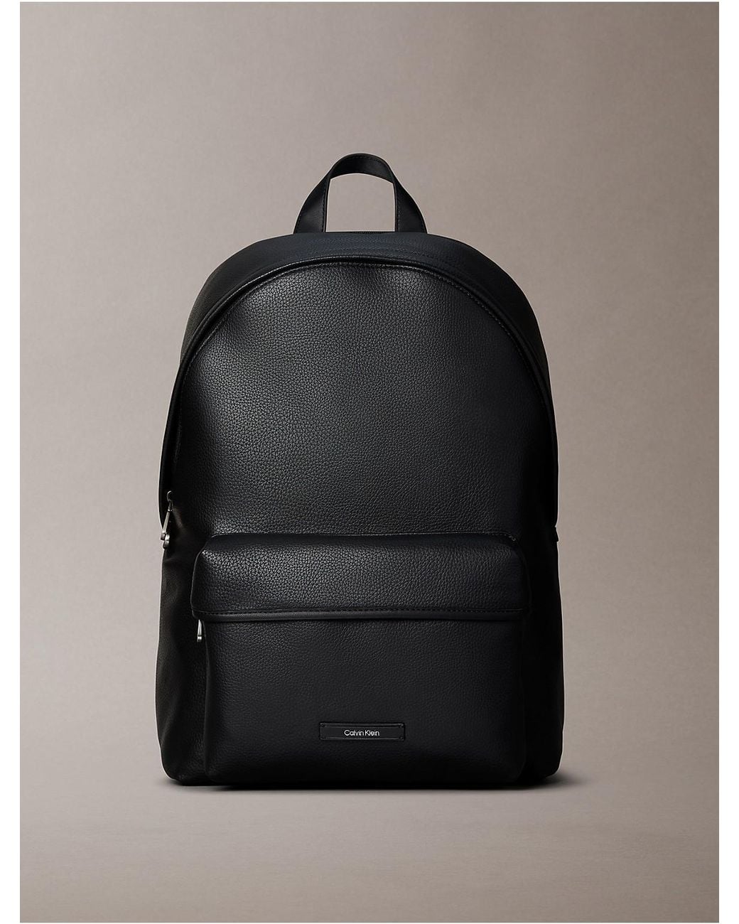 Calvin Klein Gray Pebble Round Backpack for men