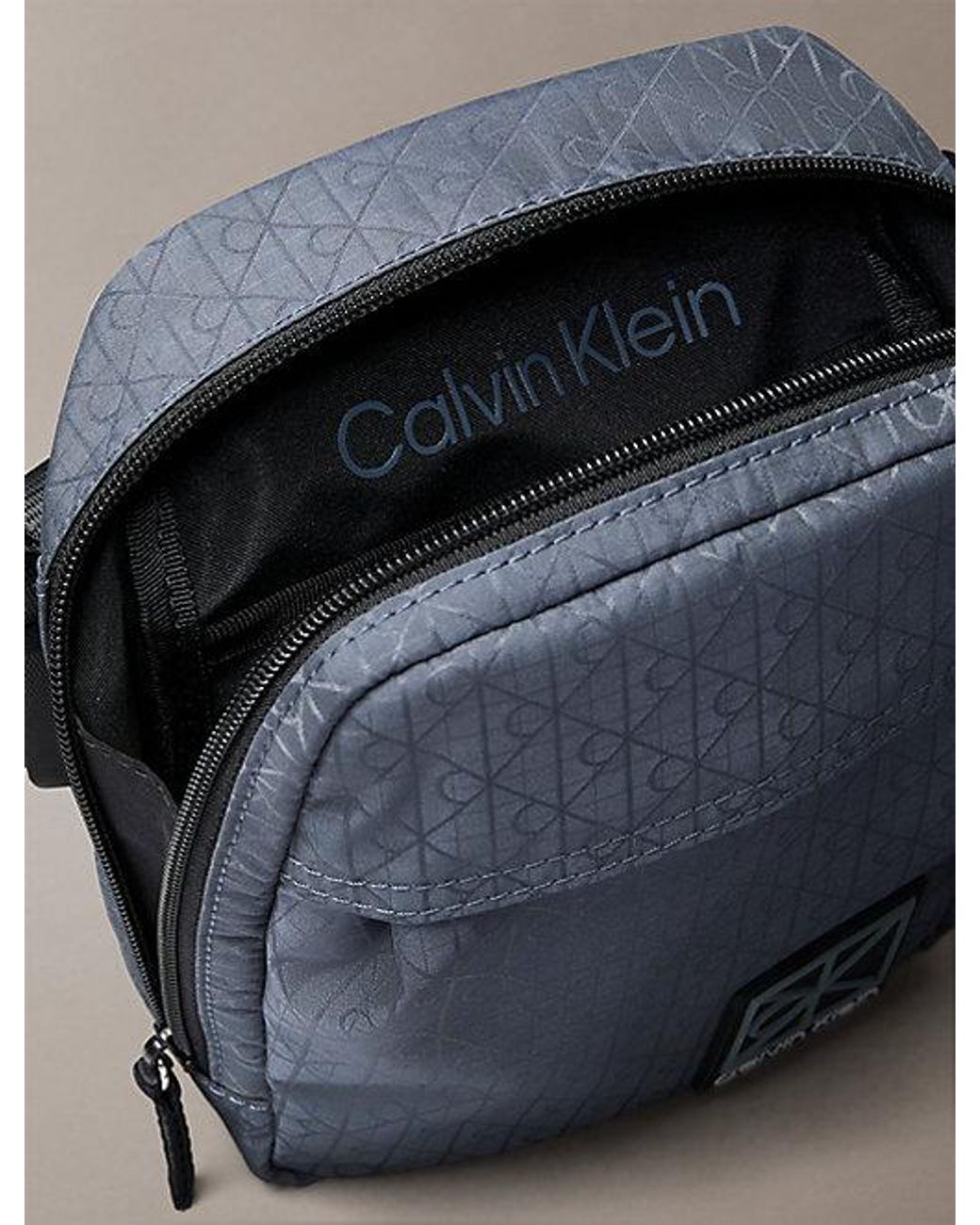 Calvin Klein Blue Water Repellent Crossbody Camera Bag for men