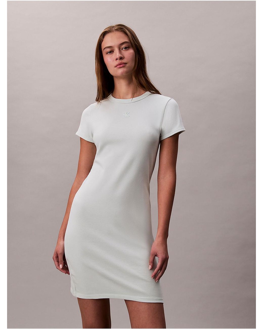 calvin klein white mini dress Calvin Klein Cotton Blend V-Neck Mini Dress In Brilliant White - 30% Off