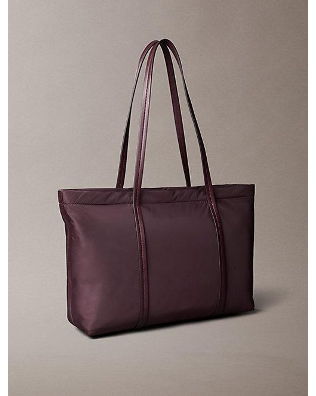 Calvin Klein Brown Embossed Monologo Tote Bag