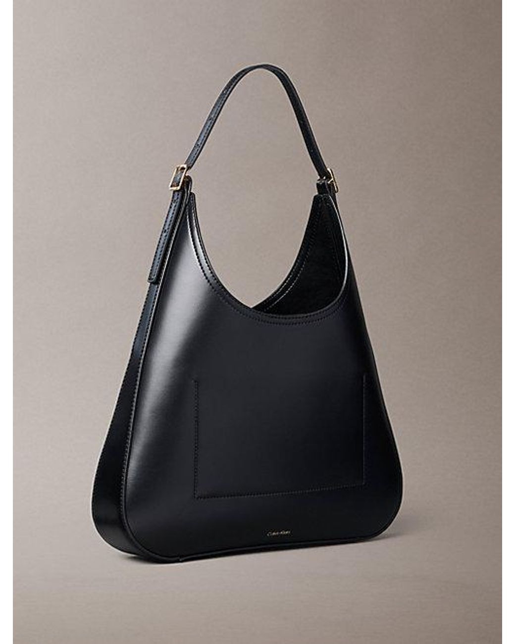 Calvin Klein Black Monogram Hardware Curved Shoulder Bag
