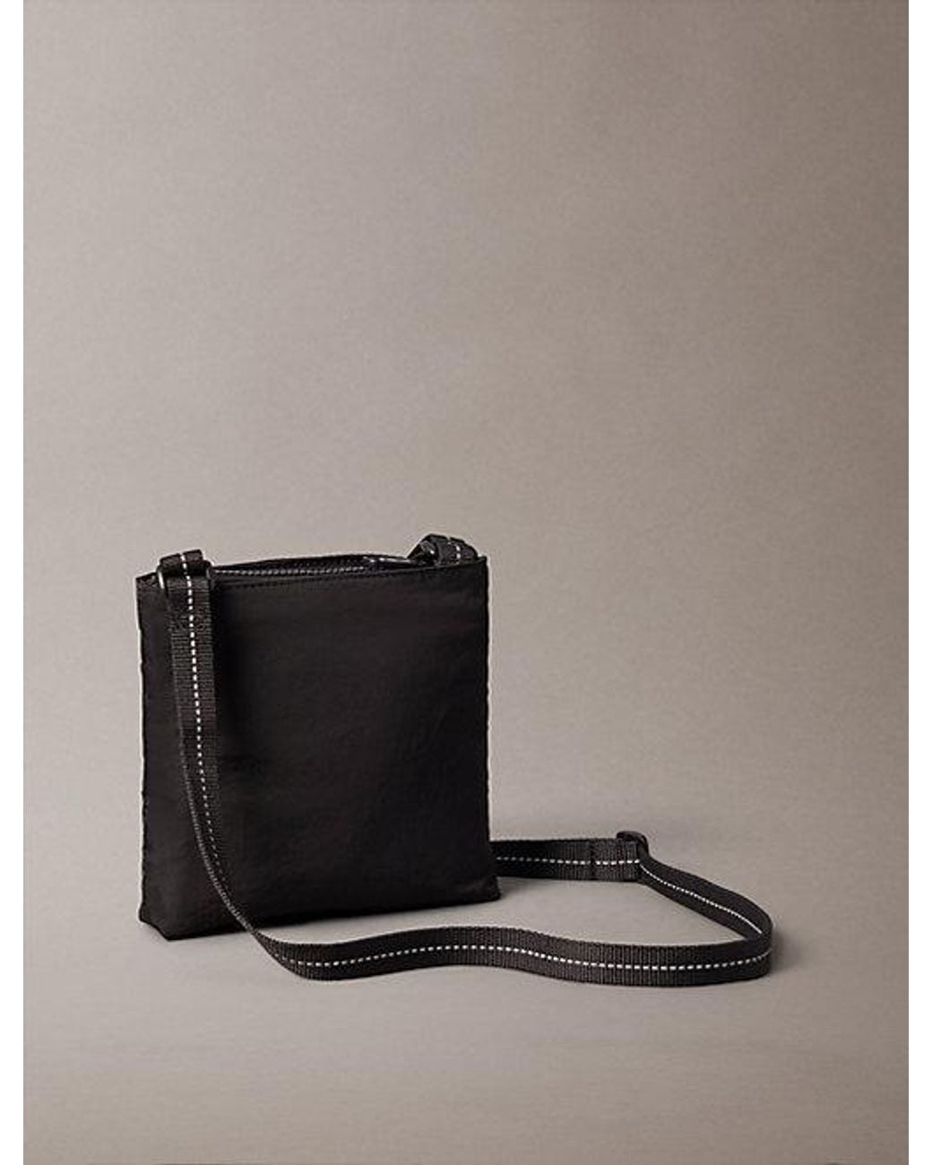 Calvin Klein Black Striped Utility Zip Flat Pack for men