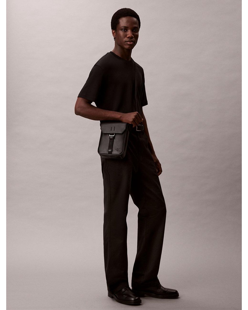 Calvin Klein Black Cargo Flap Reporter Bag for men