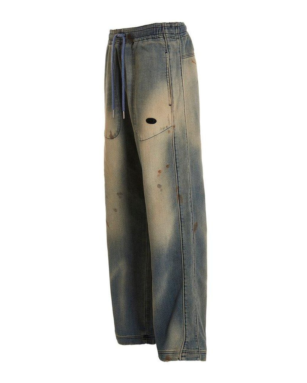 Distressed track best sale denim