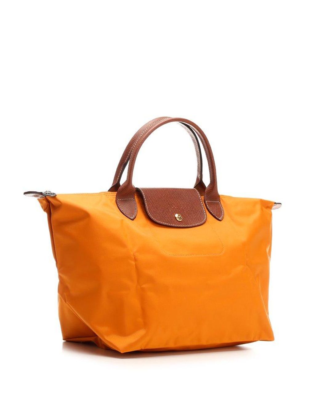 Longchamp Le Pliage Medium Top Handle Bag in Orange | Lyst Canada