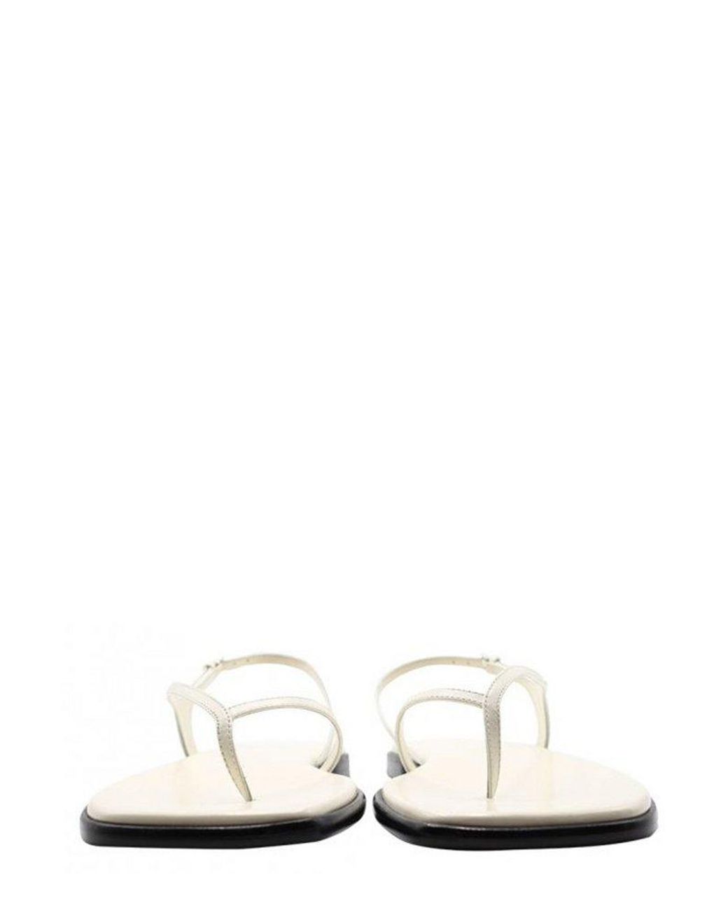 The Row Constance Flat Strappy Thong Sandal in White | Lyst The Row Constance Flat Strappy Thong Sandal in White | Lyst