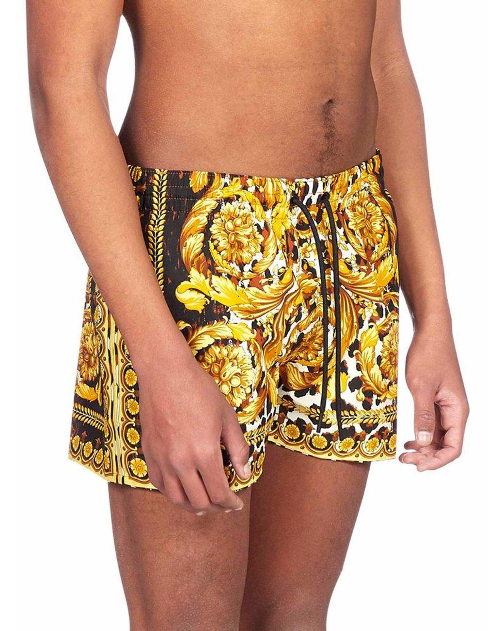 wild baroque print swim shorts