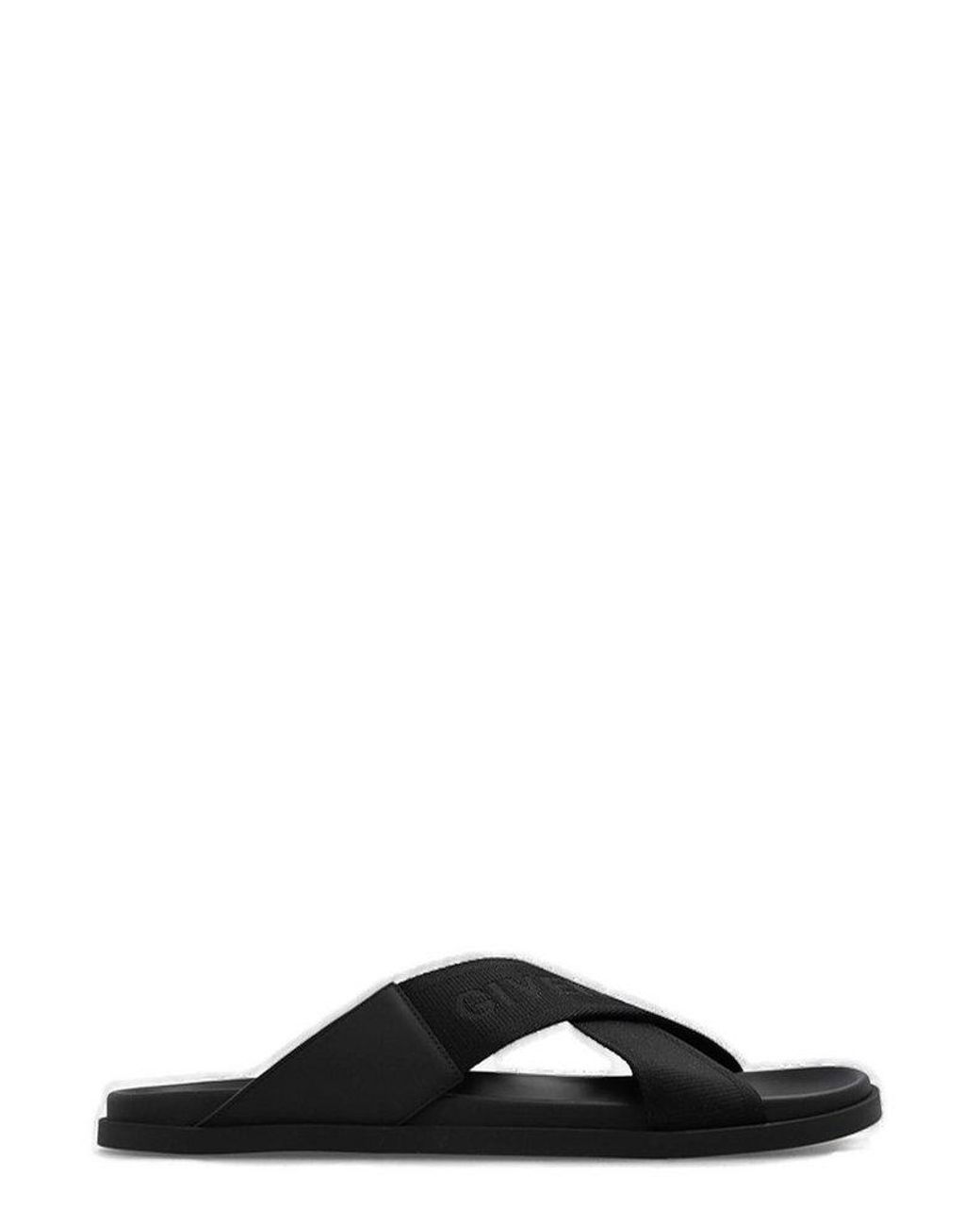 Givenchy Logo Embossed Slides in Black for Men | Lyst