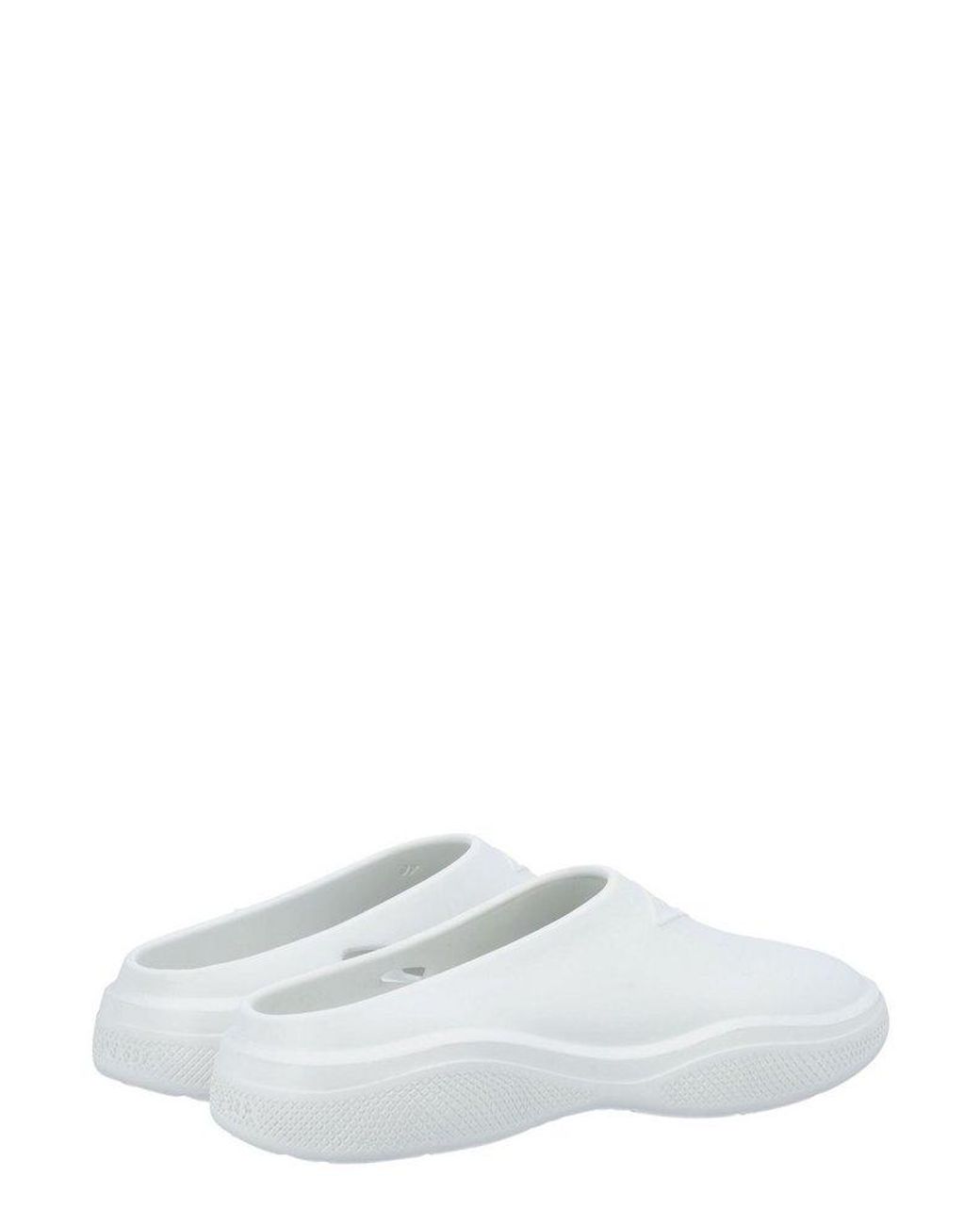 【送料&関税込】Prada Mellow Rubber Mules Prada Mellow logo-embellished Mules | Pink | FARFETCH