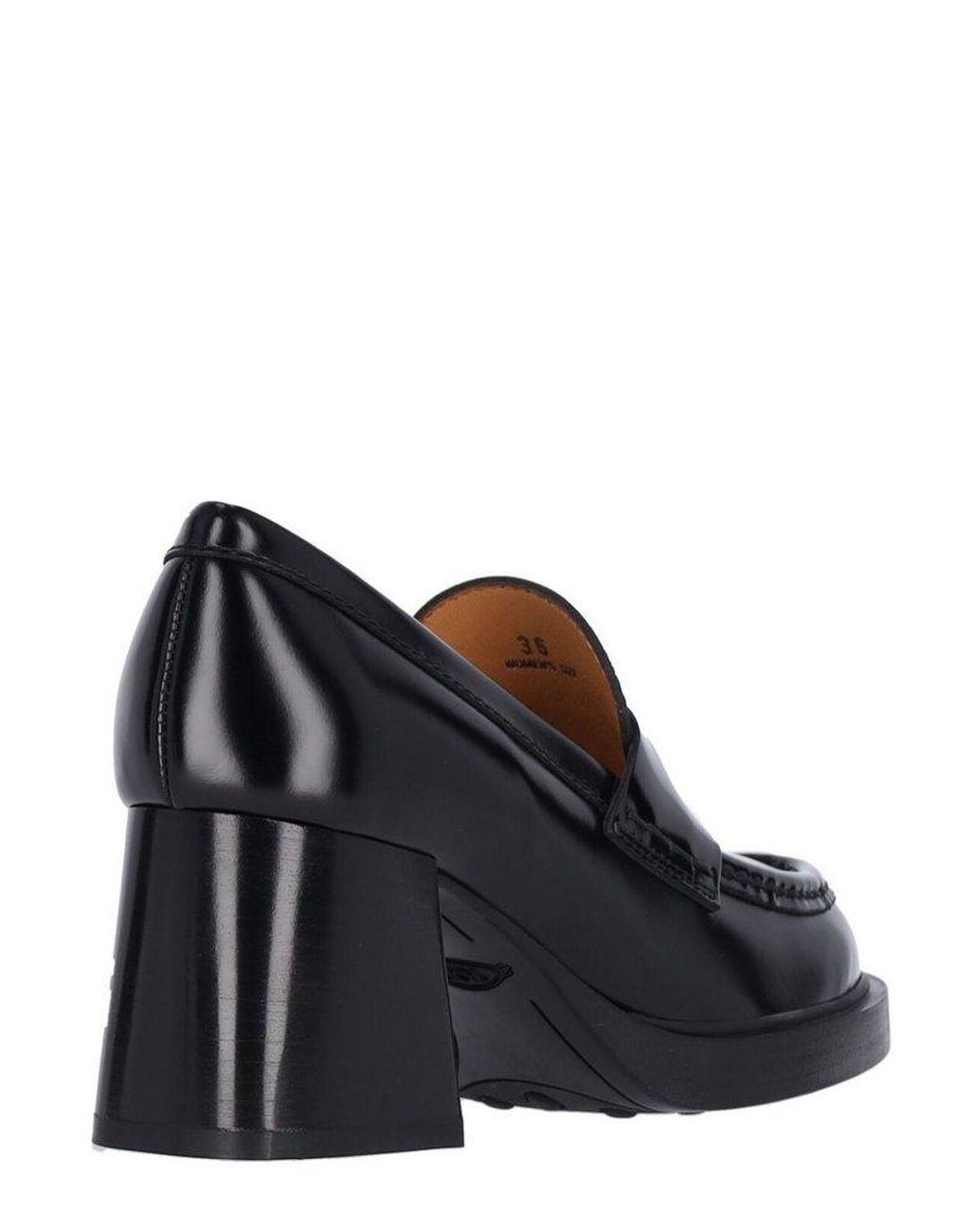 Tod's Logo Engraved Pumps in Black | Lyst