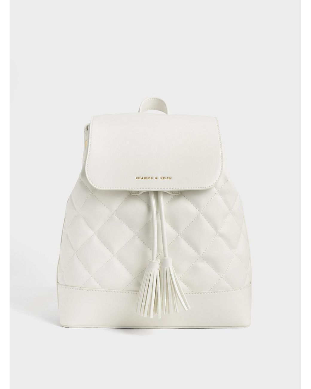 Charles and keith outlet tassel backpack