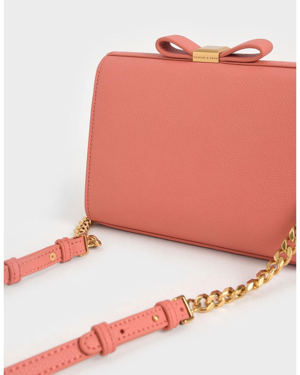 Charles Keith Bow Envelope Clutch in Pink Lyst
