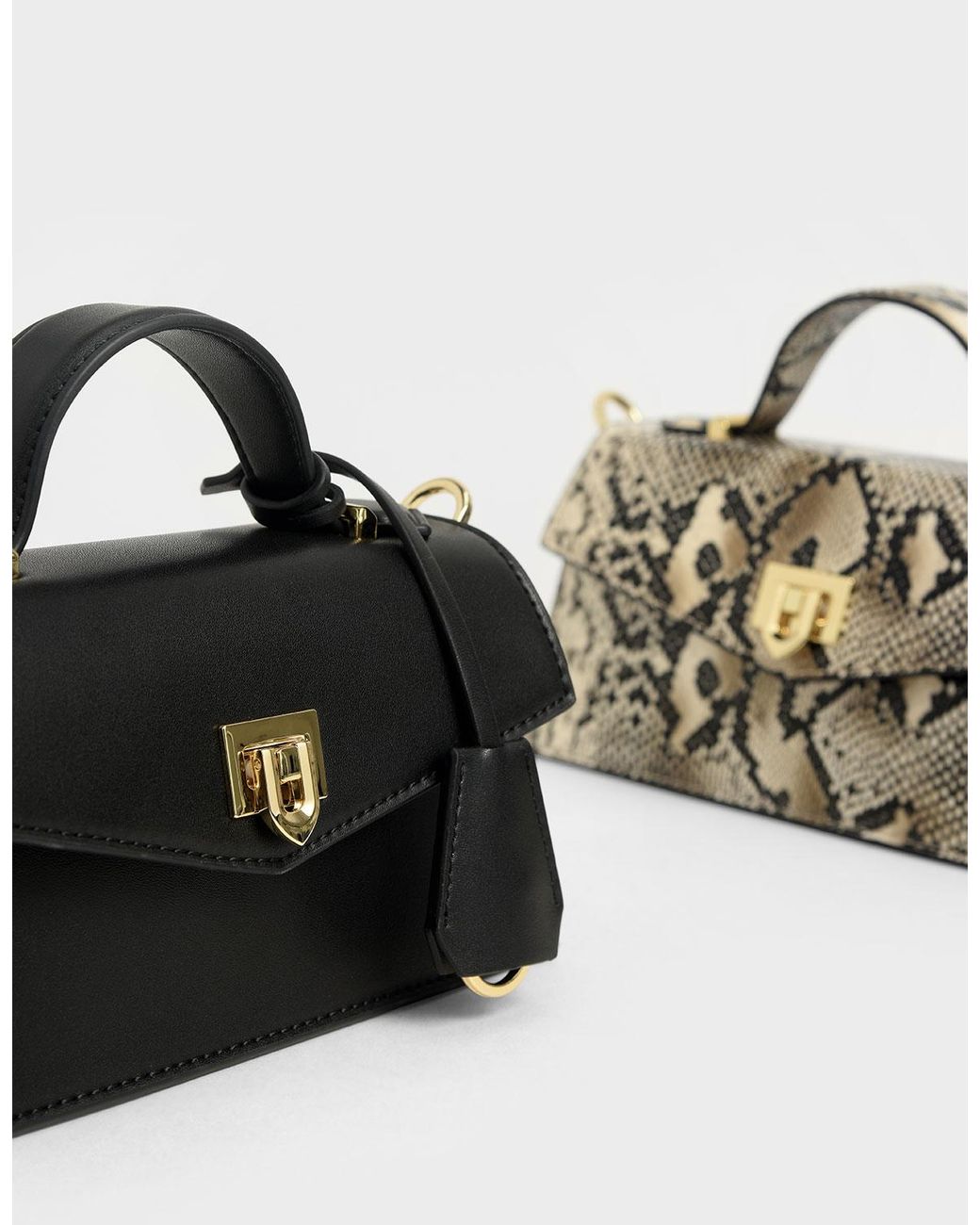 top handle trapeze bag