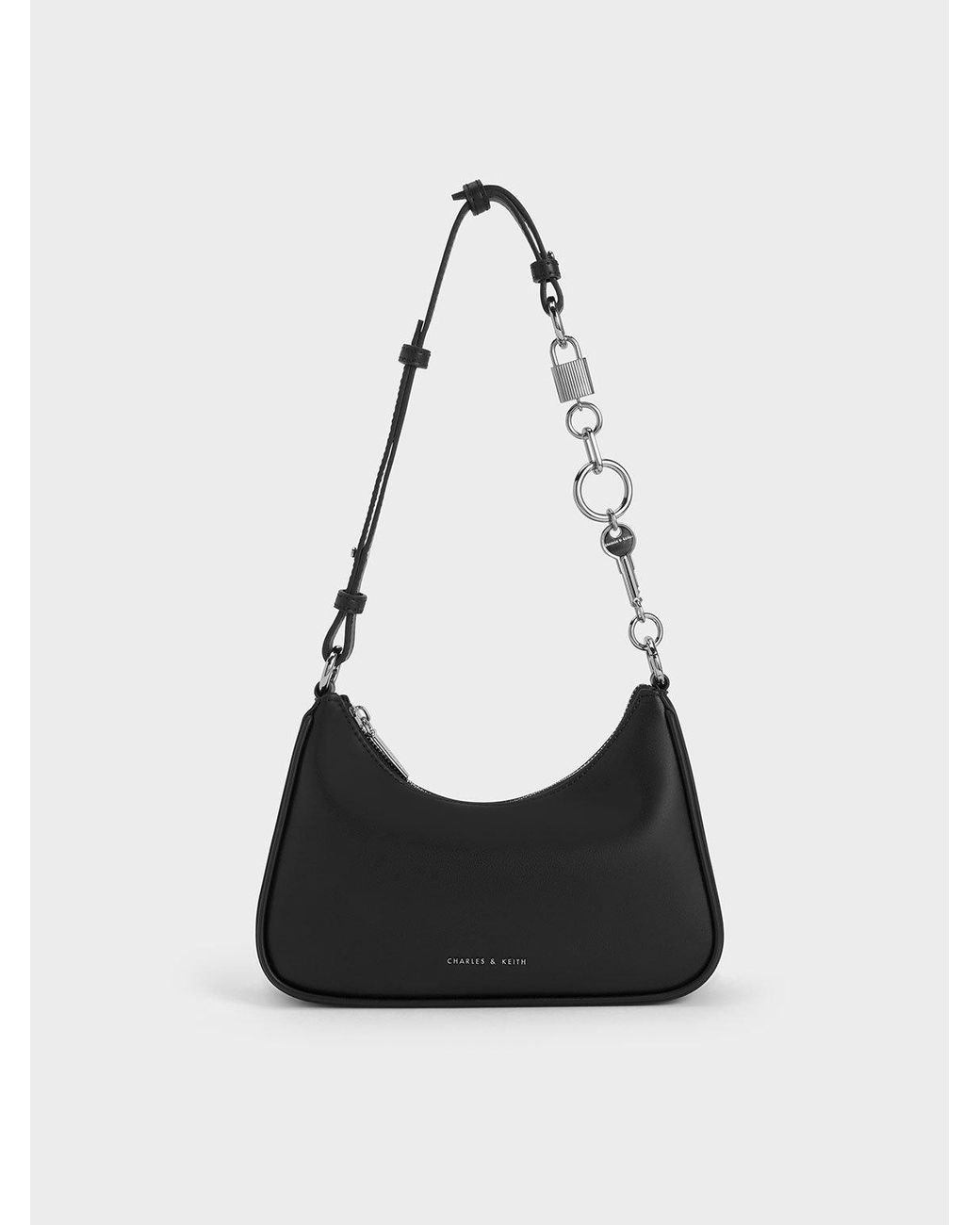Charles & Keith Lane Lock & Key Chain Handle Trapeze Bag in