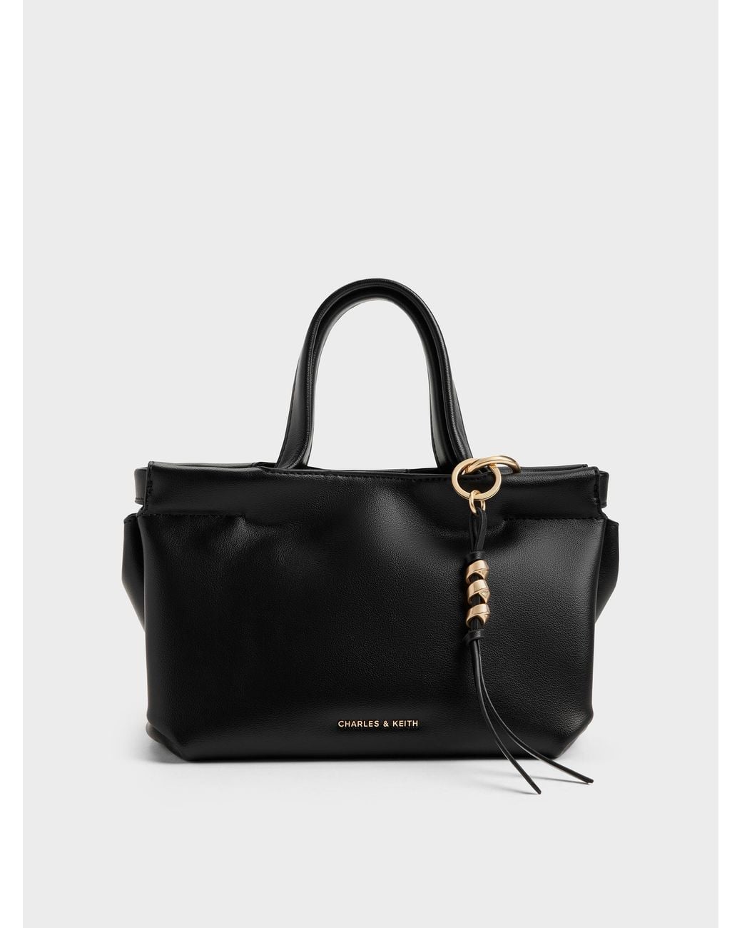 Charles & Keith Black Mini Zephyr Tassel Tote Bag