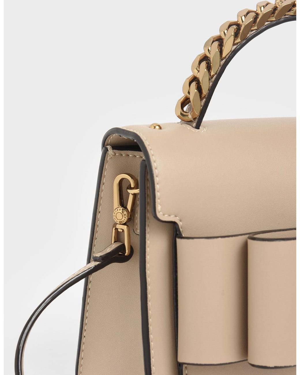 Chunky metal top handle bow flap bag hotsell