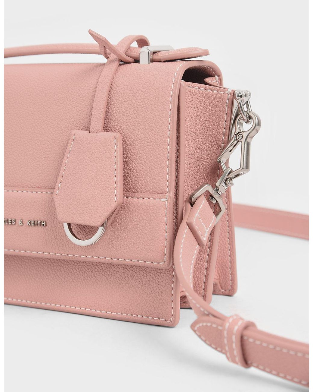 charles and keith pink fur bag