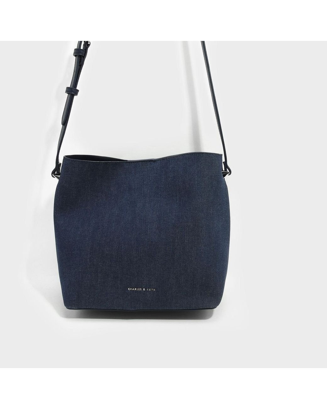 charles and keith navy blue bag
