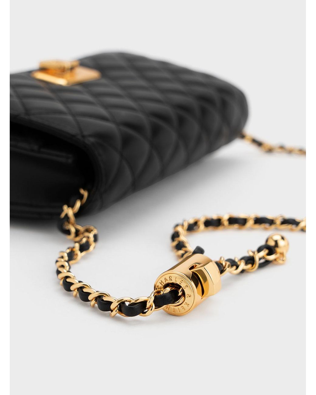 Charles & Keith Cressida Quilted Push-lock Clutch in Black | Lyst