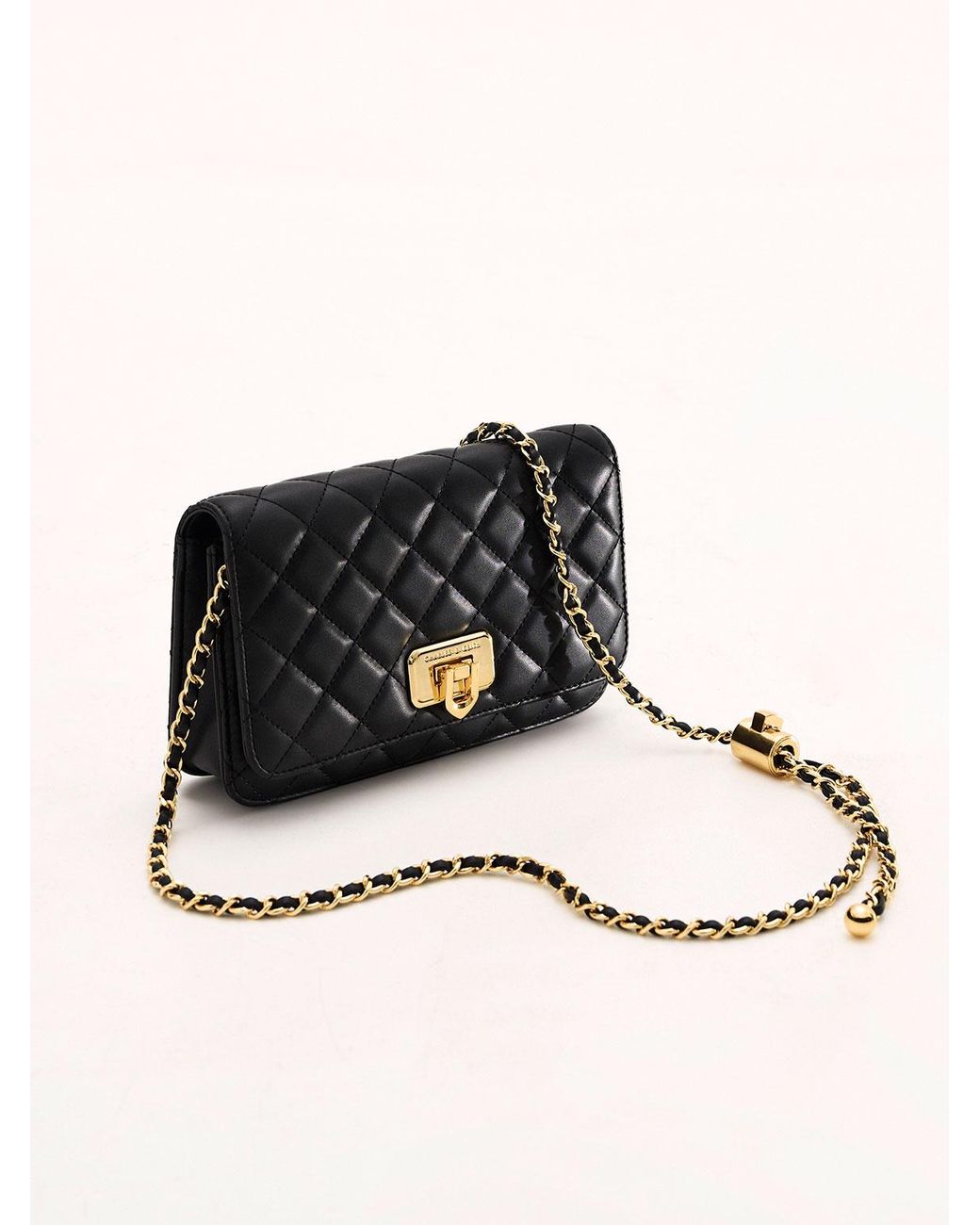 Charles & Keith Cressida Quilted Push-lock Clutch in Black | Lyst