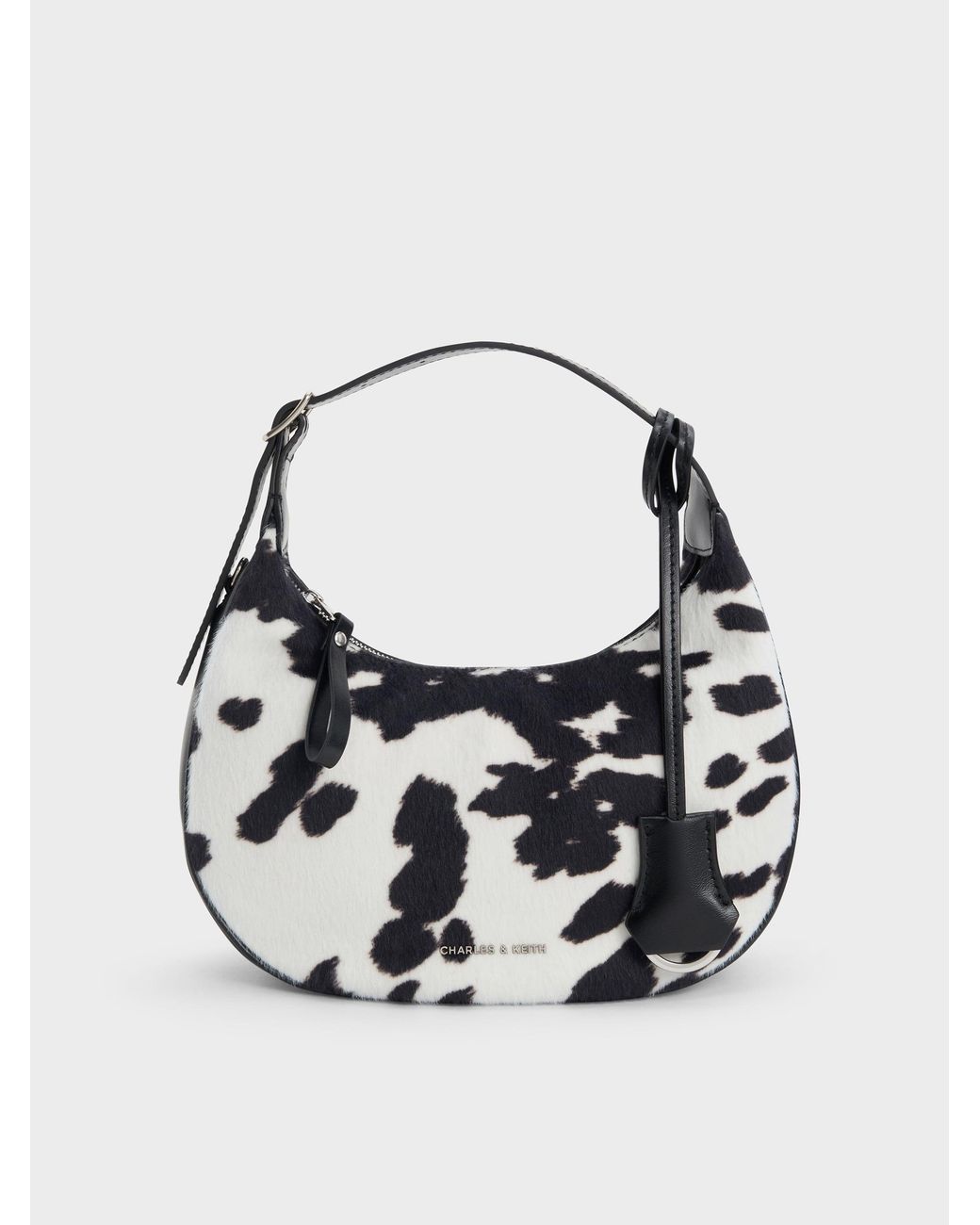 Charles & Keith Multicolor Vega Furry Cow-Print Hobo Bag