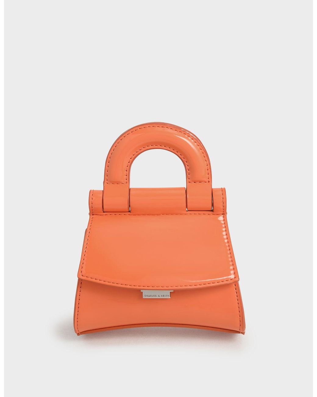 charles and keith orange bag