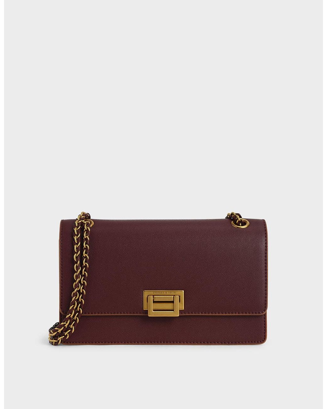 charles and keith padlock shoulder bag