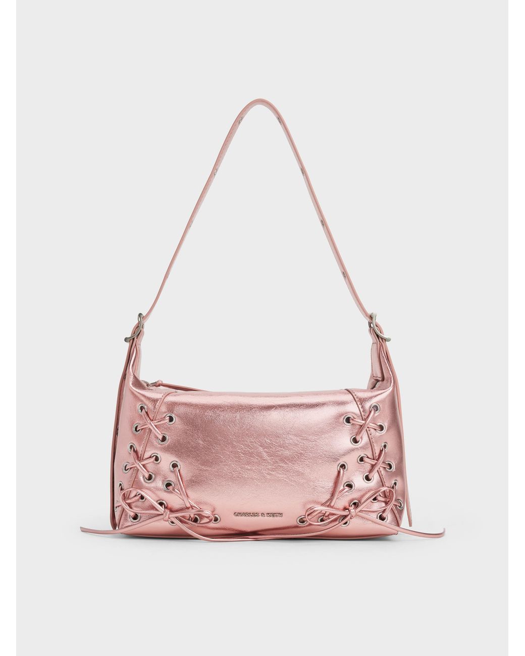 Charles & Keith Pink Xylia Metallic Grommet Lace-up Shoulder Bag